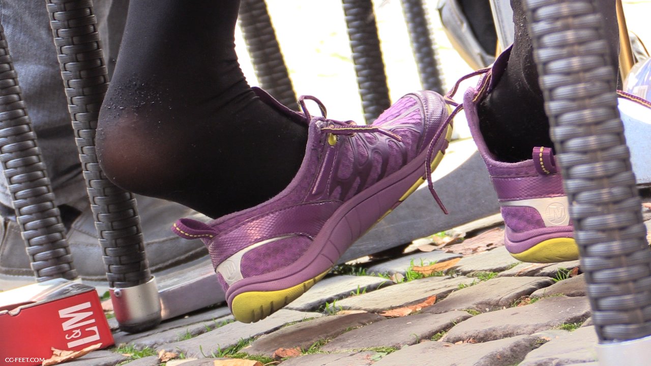 Girl shows sweaty stinky converse sneaker